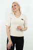Sabra elegancka bluzka damska z naszywką O09KW4898 - beż