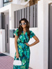Długa sukienka wzorzysta z kopertowym dekoltem - zielony